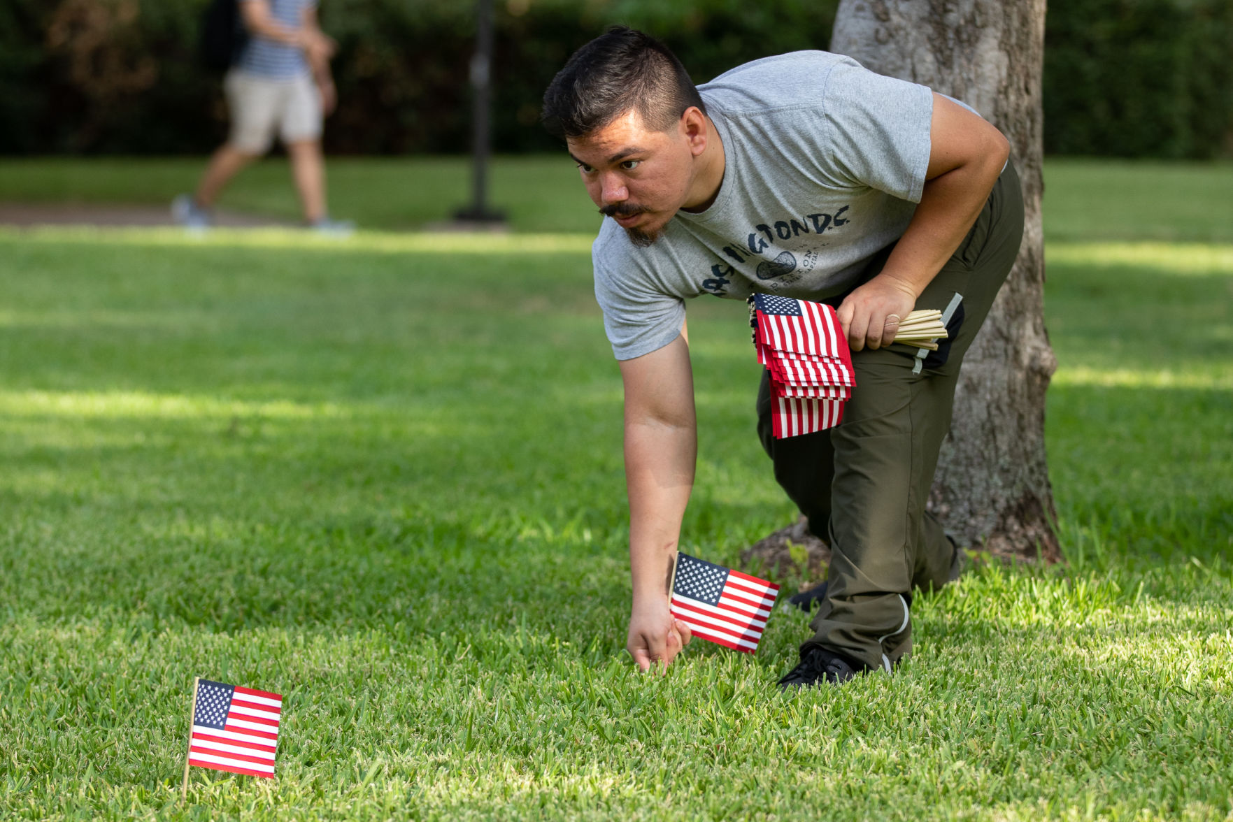 Student organization places 2,977 flags to memorialize the lives lost during 9/11 attacks